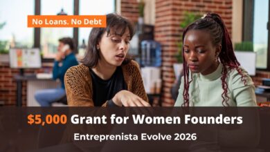 A professional woman founder reviewing business growth plans for the Entreprenista Evolve Grant 2026