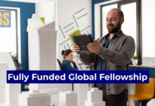 A tech professional reviewing a digital strategy for the Internet Society Mid-Career Fellowship 2026 global leadership program.