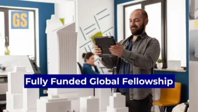 A tech professional reviewing a digital strategy for the Internet Society Mid-Career Fellowship 2026 global leadership program.