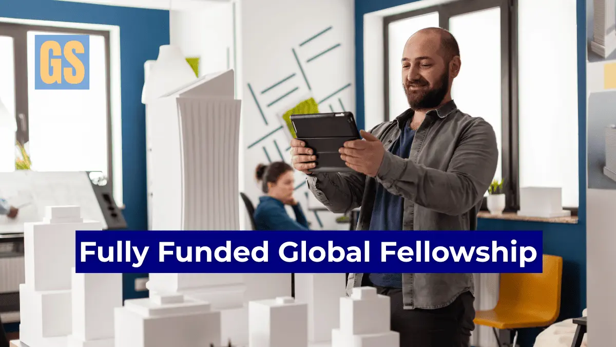 A tech professional reviewing a digital strategy for the Internet Society Mid-Career Fellowship 2026 global leadership program.