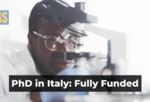 A researcher analyzing data for the PhD Economics Statistics and Data Science Italy 2026 program at the University of Milano-Bicocca.