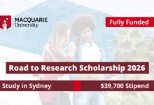 An international student on campus representing the fully funded Road to Research Scholarship 2026 at Macquarie University in Sydney with a $39,700 stipend.
