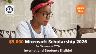 A young woman coding on a laptop in a STEM lab for the Women at Microsoft Scholarship Program 2026 $5,000 award